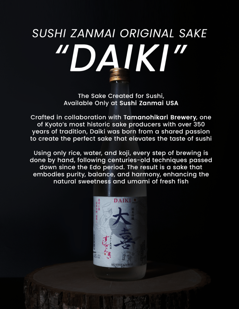 A close-up of Daiki Junmai Ginjo sake bottle with detailed English text explaining its 350-year heritage and collaboration with Kyoto's Tamanohikari Brewery.